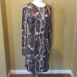 Jennifer Lopez snake print long sleeve dress